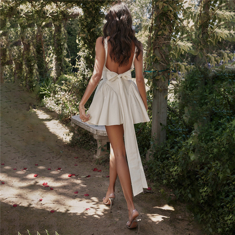 White Ruffled Dress With Back Bow Tie